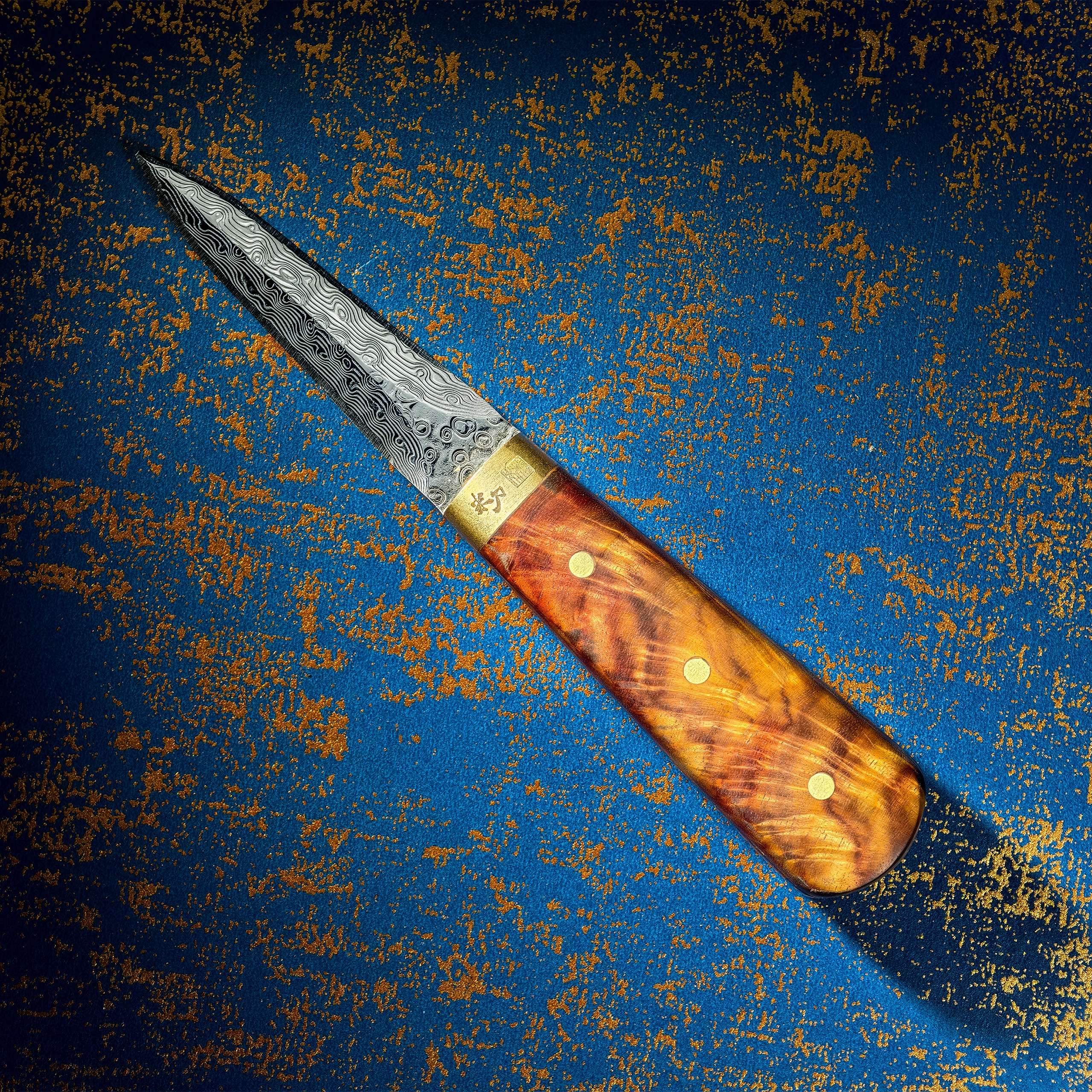 østerskniv I Damaskusstål